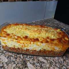A picture of Pastel de choclo y carne 🌽🍖.