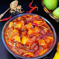 A picture of Sweet and Sour Mango Pickle / Guramma.