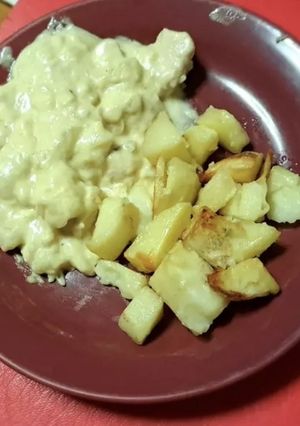 Una foto de Pollo a la crema con papas