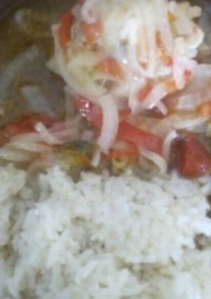 Una foto de Pollo encebollado