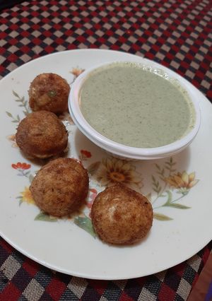A picture of Yoghurt Balls with Green Dip.