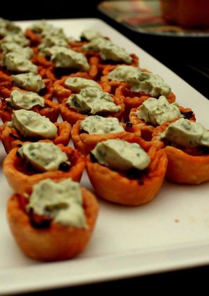 A picture of Caramelized Onion Tartlets with Basil Mascarpone.