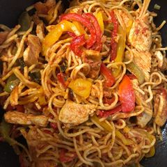 A picture of Chicken noodles stir fry.