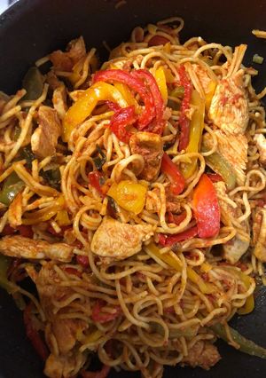 A picture of Chicken noodles stir fry.