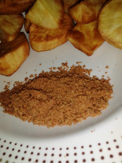 A picture of Potatoes and groundnut cake.