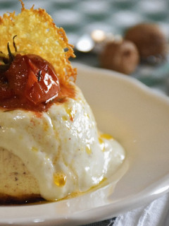 Foto di Piccolo flan di parmigiano con pomodori confit