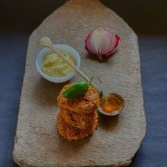 A picture of Kasundi o Posto Bora (Bengal Mustard with Poppy Seed Fritters).