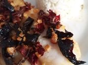 Una foto de filete al mojo de ajo