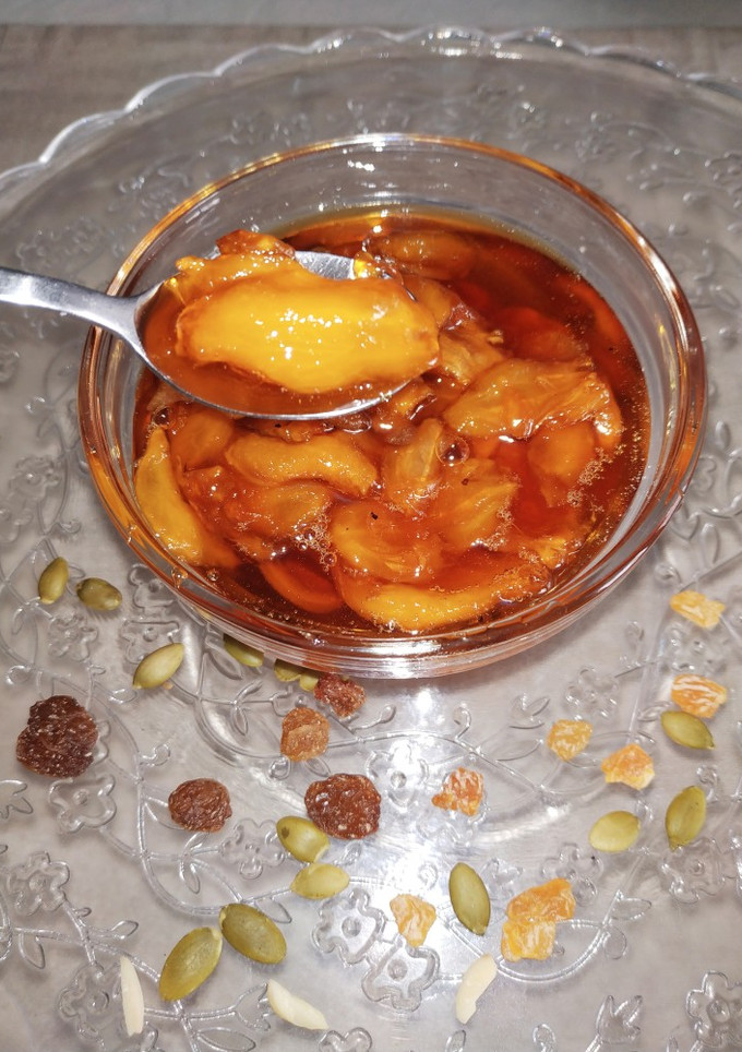 Una foto de Nísperos caramelizados