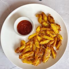 Crispy garlic potato wedges A picture of Crispy garlic potato wedges.
