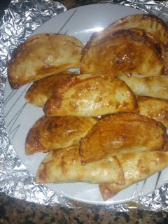 Una foto de Empanadillas dulces de boniato, canela y almendras