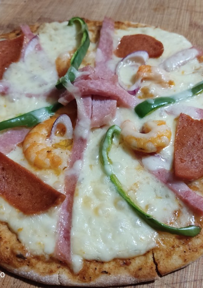 Una foto de Pizza mixta con camarones