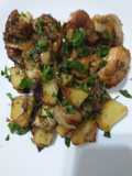 Pollo al ajillo y papas al horno