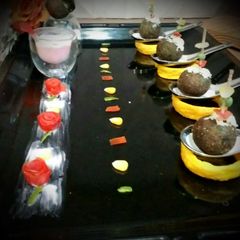 A picture of Spinach Cheese Poppers With Beetroot Dip.