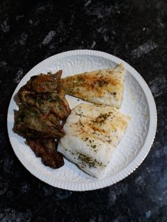 Una foto de Bacalao a la plancha con pimientos en tempura