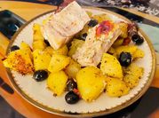 Una foto di merluzzo patate