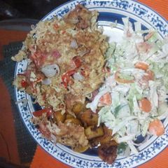 Fried indomine, side salad and plantain A picture of Fried indomine, side salad and plantain.