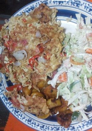 A picture of Fried indomine, side salad and plantain.
