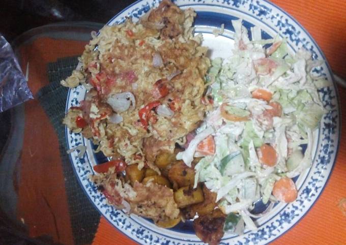 Fried indomine, side salad and plantain