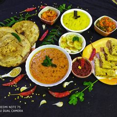 A picture of Urad Dal with Multigrain Bhakri, Garlic Chutney,jarda.