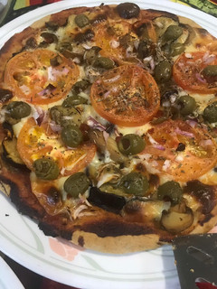 Una foto de Pizza vegetariana