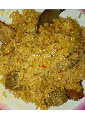 A picture of Jollof din shinkafa.