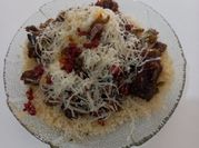 Una foto de couscous con berenjena