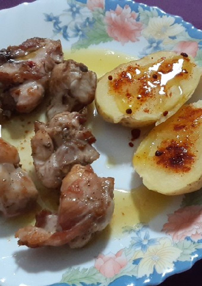 Una foto de Conejo al ajillo con patata