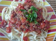Una foto de carne en salsa comino