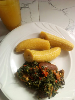 A picture of Boiled plantain and vegetable sauce.