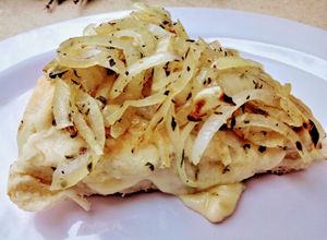 Una foto de Pizza fugazzeta rellena