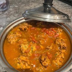 Non fried Lauki Kofta in rich tomato gravy A picture of Non fried Lauki Kofta in rich tomato gravy.