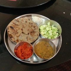 A picture of Black udad dal (like dalmukhani) Every sunday lunch Spoon.