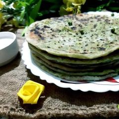Karaishutir Parota, hungcurd/ Green peas stuffed bread with hungcurd A picture of Karaishutir Parota, hungcurd/ Green peas stuffed bread with hungcurd.