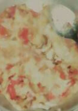 A picture of Fried eggs served with ugali.