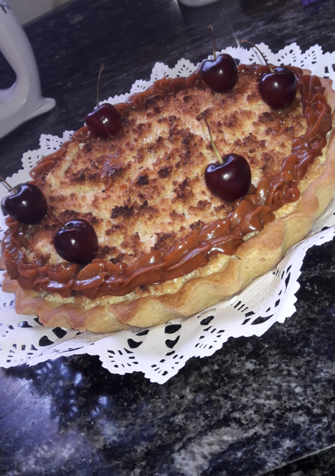 Una foto de Tarta de coco y dulce de leche