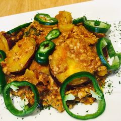 Sweet potato on bolognese sauce A picture of Sweet potato on bolognese sauce.
