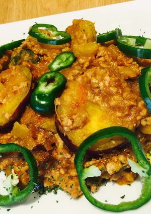 A picture of Sweet potato on bolognese sauce.