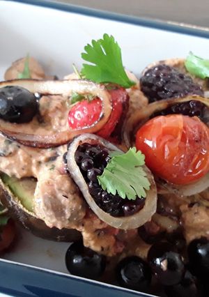 A picture of Sig's Grilled avocado with fruity mushroom sauce.
