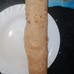 A picture of Breakfast egg paratha roll.