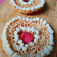 Rajasthani ghevar with white chocolate ganache A picture of Rajasthani ghevar with white chocolate ganache.