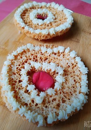 A picture of Rajasthani ghevar with white chocolate ganache.