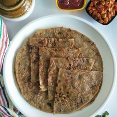 A picture of Aaloo Paratha (Potato Stuffed Whole Wheat Flatbread).