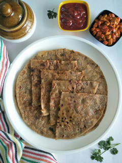 A picture of Aaloo Paratha (Potato Stuffed Whole Wheat Flatbread).