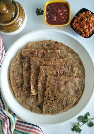 A picture of Aaloo Paratha (Potato Stuffed Whole Wheat Flatbread).