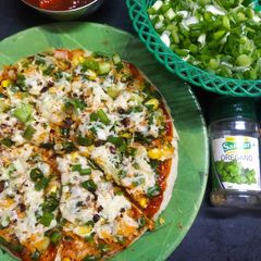 A picture of Green onion pizza.