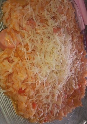 Una foto de Arroz con salsa