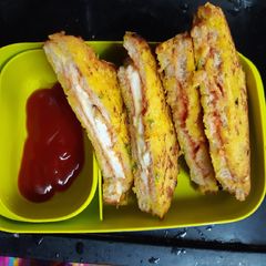 A picture of Paneer cheese ketchup pakoda.