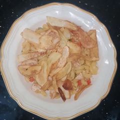 A picture of Chicken vegetable Macaroni with crunch fries.