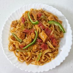 A picture of 3 Color Fettuccini Peri Peri Creamy Pasta.